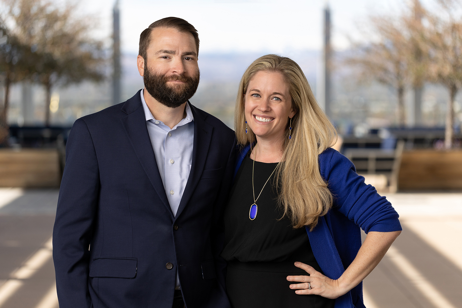 Dennis and Brittany Lanphier, founding partners of Lanphier LLP, on a Denver rooftop terrace