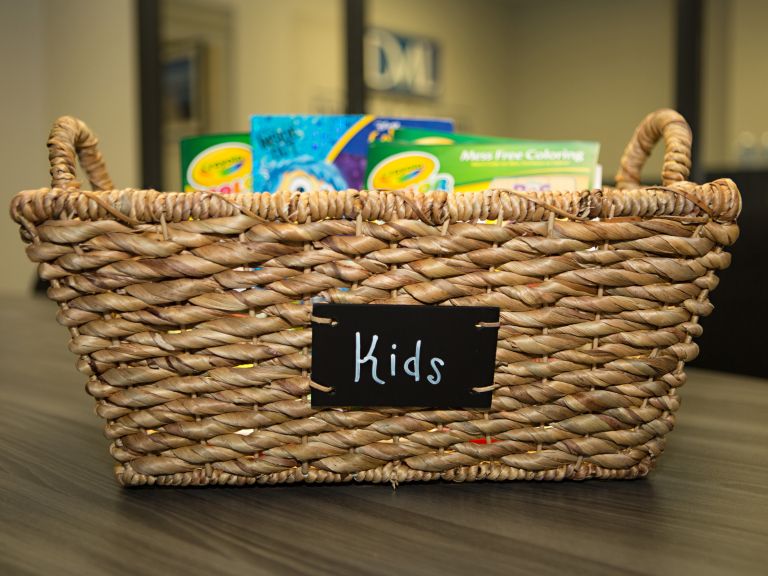 Kids coloring basket in the Lanphier LLP reception area